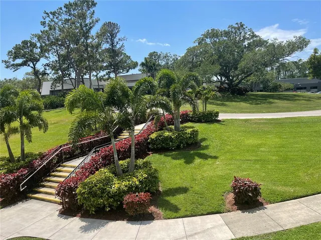 a view of a garden with an outdoor space