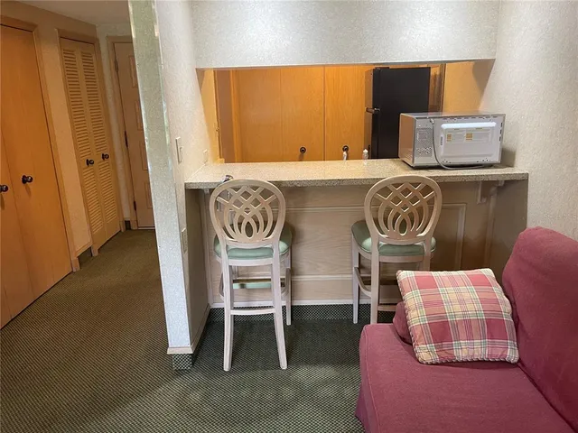 a living room with a couch and a table