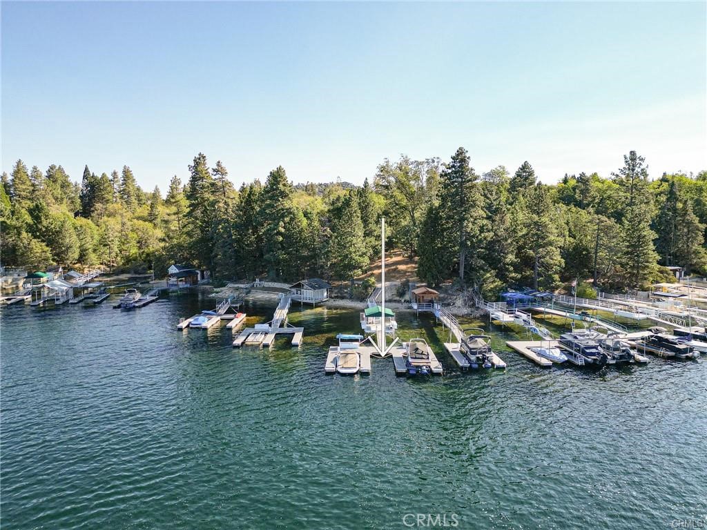 0 North Shore Road Lake Arrowhead, CA 92352 - Photo 6 of 10 a backyard of a house with table and chairs