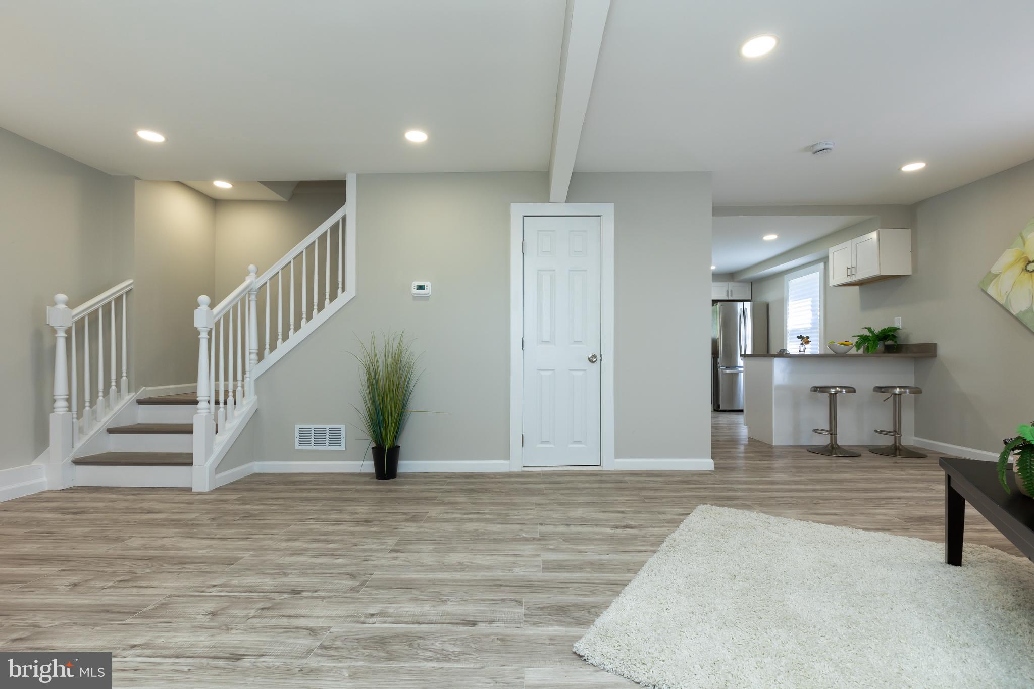 2407 Hammonds Ferry Road Halethorpe, MD 21227 - Photo 19 of 43 a view of entryway and hall with wooden floor