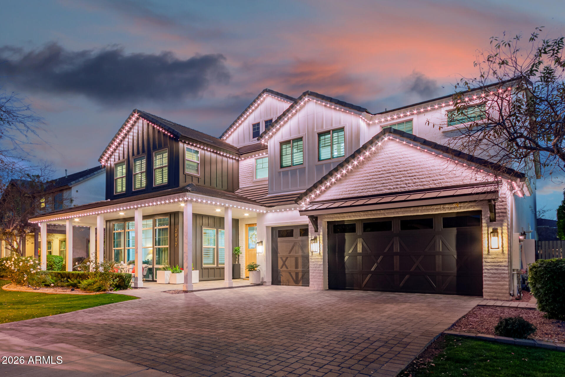 2917 East Boot Track Trail Gilbert, AZ 85296 - Photo 11 of 93 a front view of a house with yard and green space