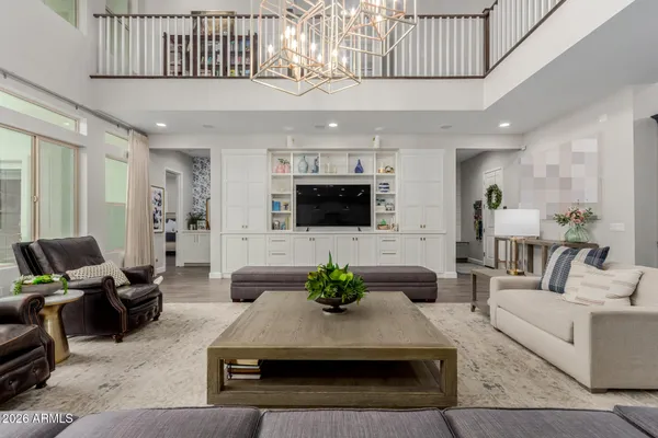 a kitchen with stainless steel appliances a stove microwave and refrigerator