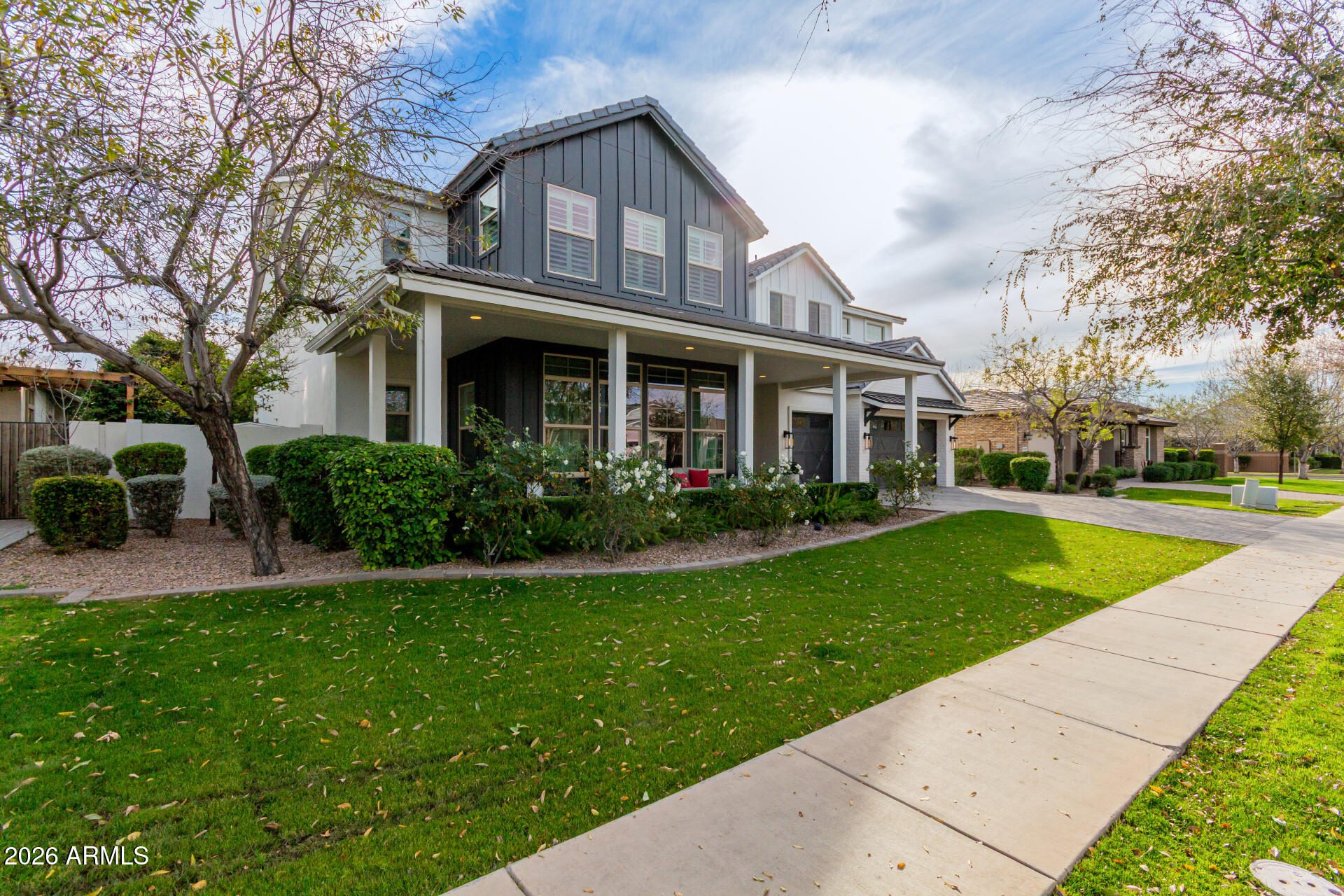 2917 East Boot Track Trail Gilbert, AZ 85296 - Photo 2 of 93 a front view of a house with a yard