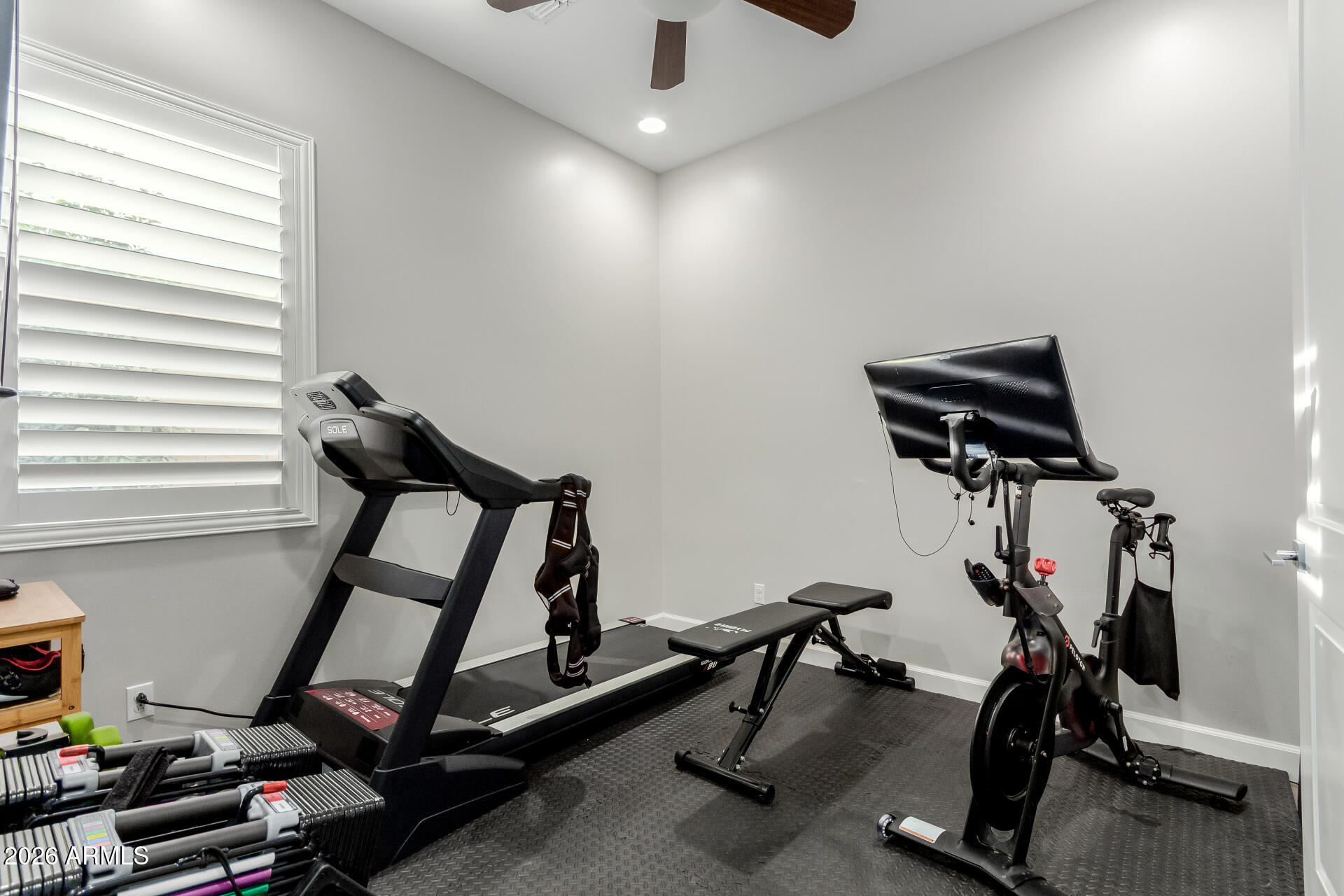 2917 East Boot Track Trail Gilbert, AZ 85296 - Photo 36 of 93 a view of a room with gym equipment