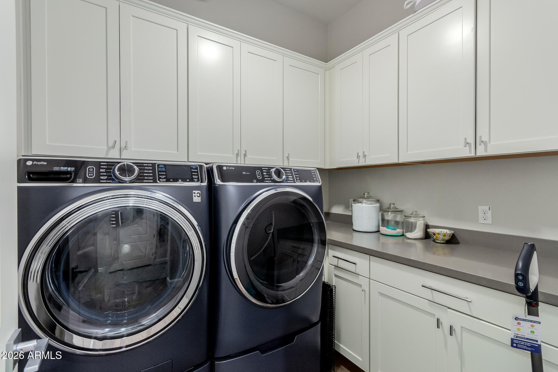 2917 East Boot Track Trail Gilbert, AZ 85296 - Photo 38 of 93 a utility room with sink dryer and washer