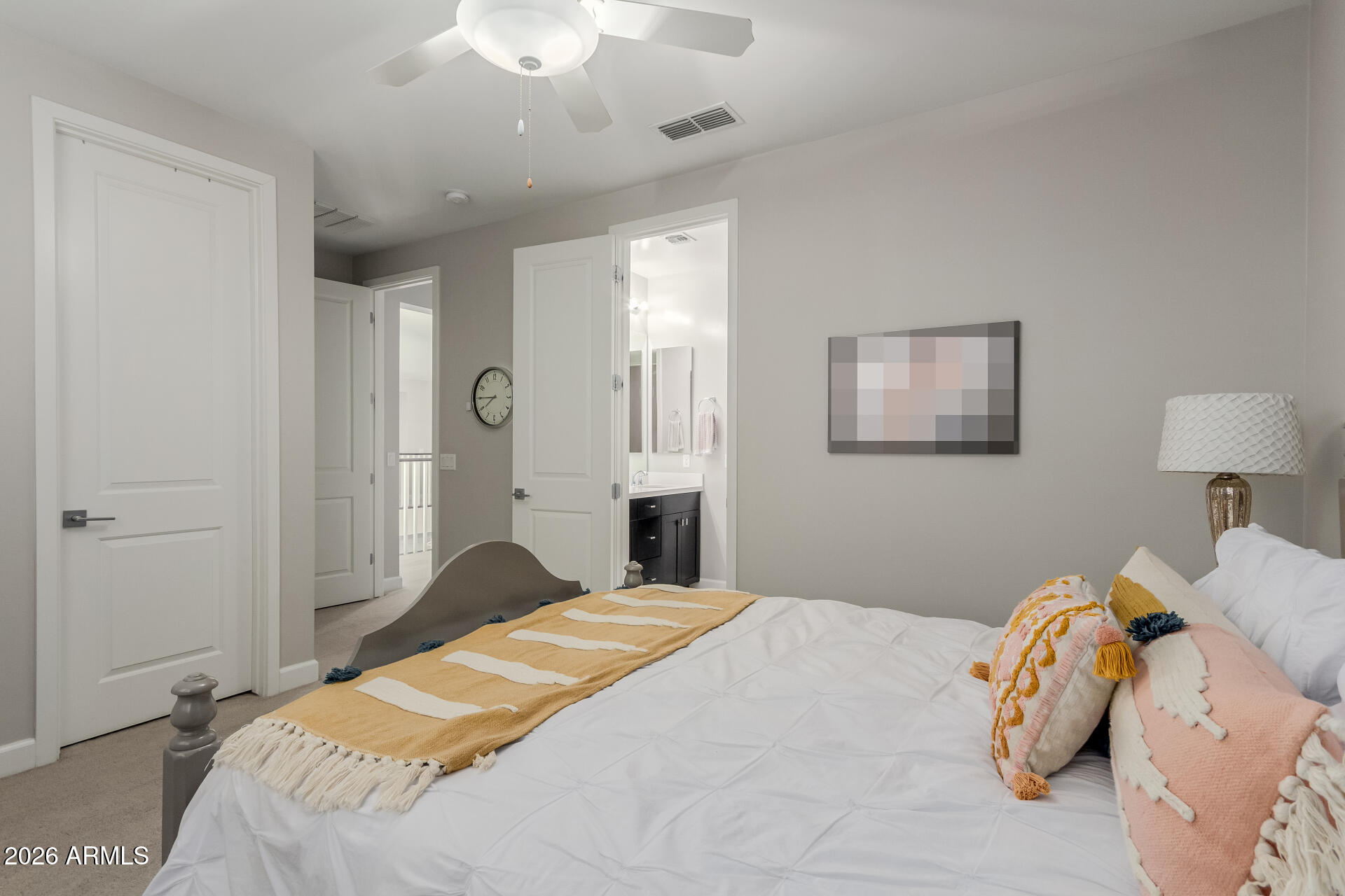 2917 East Boot Track Trail Gilbert, AZ 85296 - Photo 56 of 93 a bedroom with a bed and a lamp