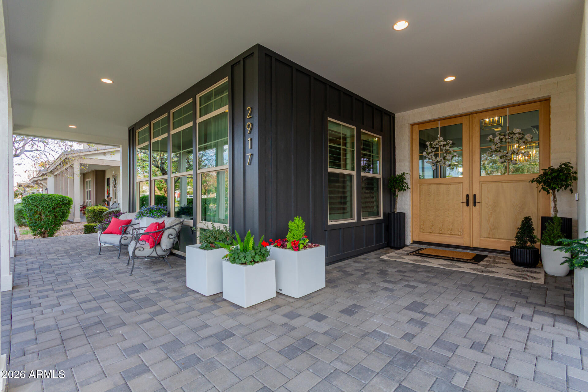 2917 East Boot Track Trail Gilbert, AZ 85296 - Photo 6 of 93 a house view with a sitting space