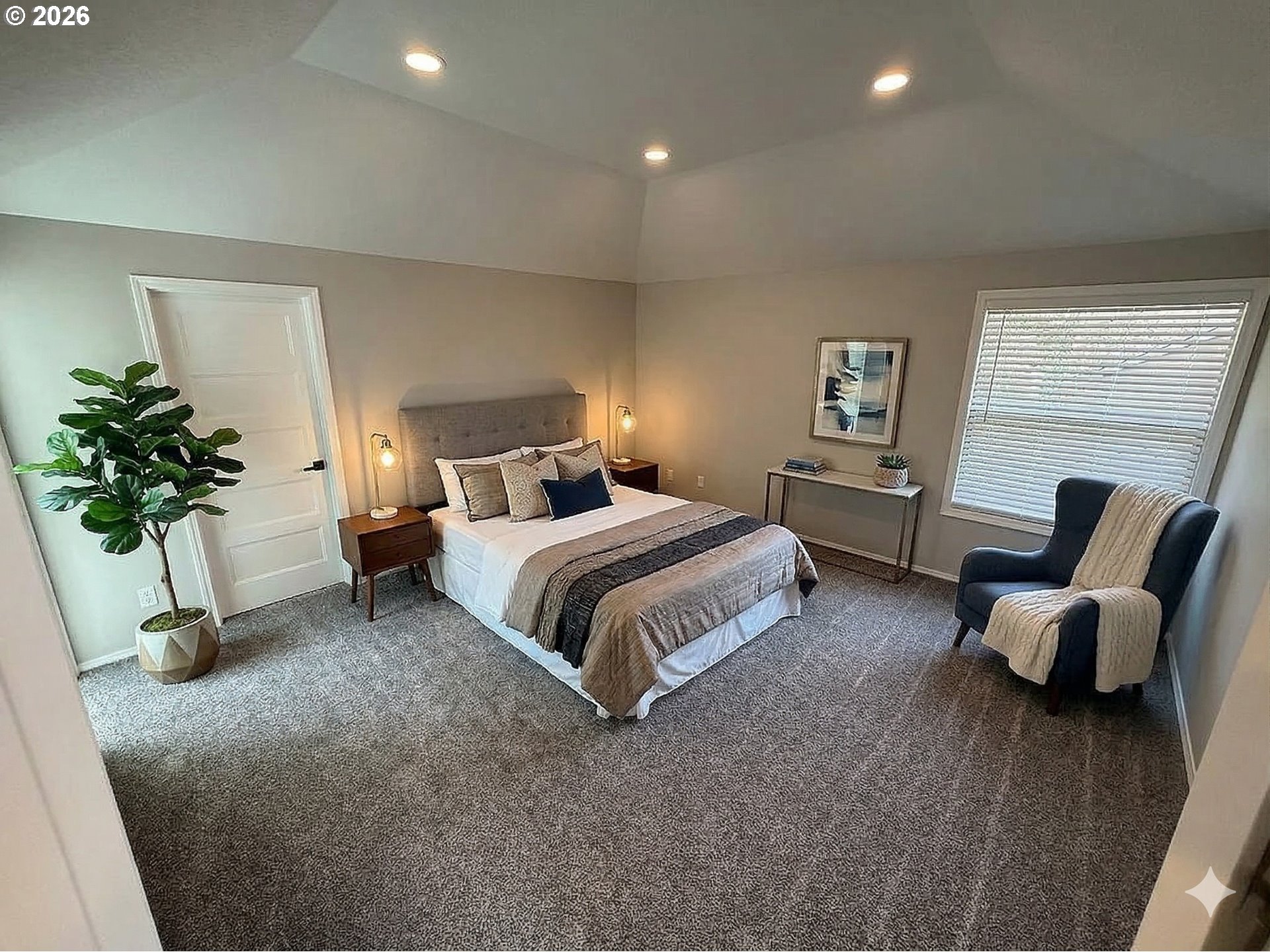 7025 Southwest 164th Terrace Beaverton, OR 97007 - Photo 12 of 28 a bedroom with bed and a couch