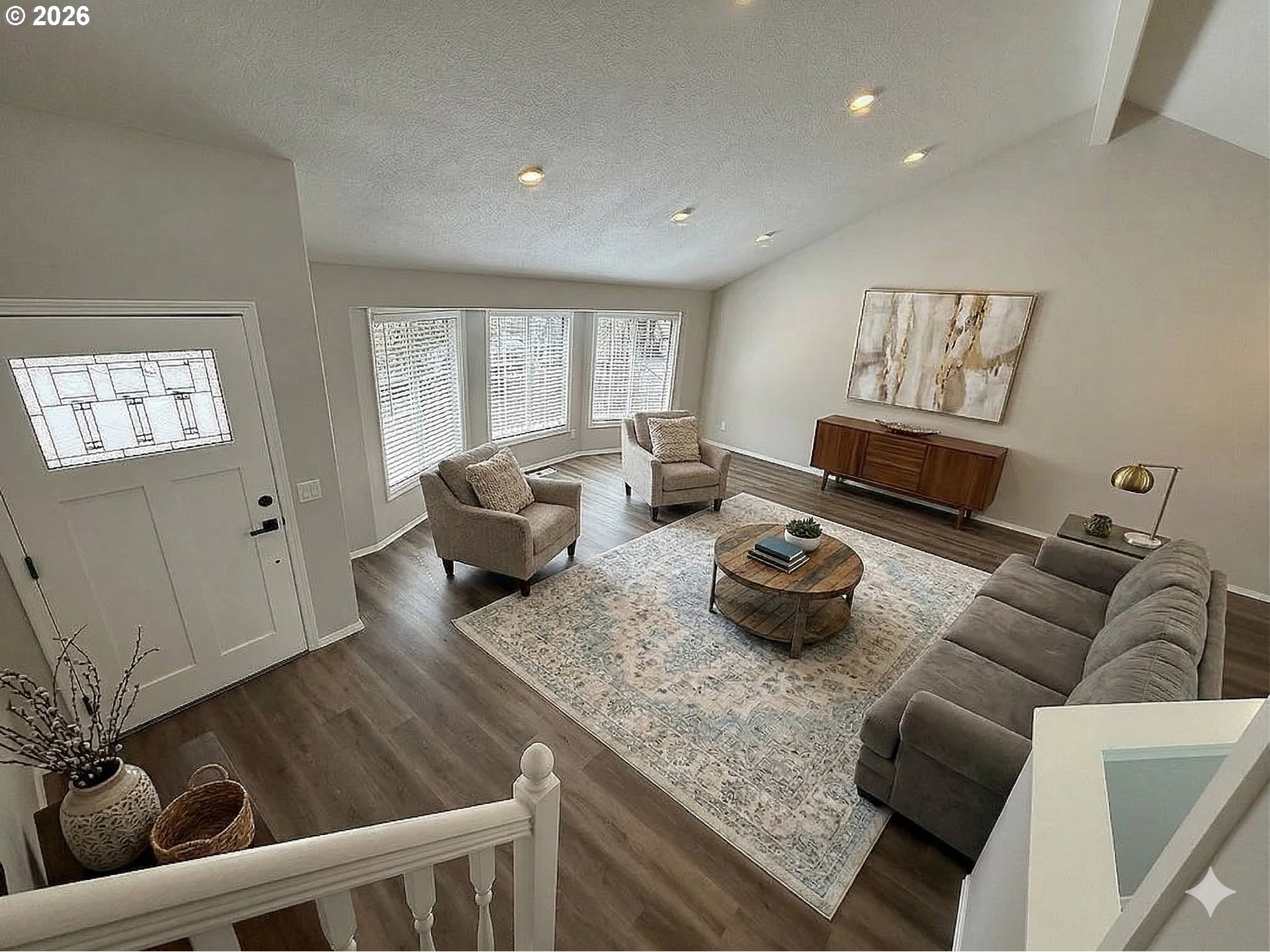 7025 Southwest 164th Terrace Beaverton, OR 97007 - Photo 2 of 28 a living room with furniture or couch and a window