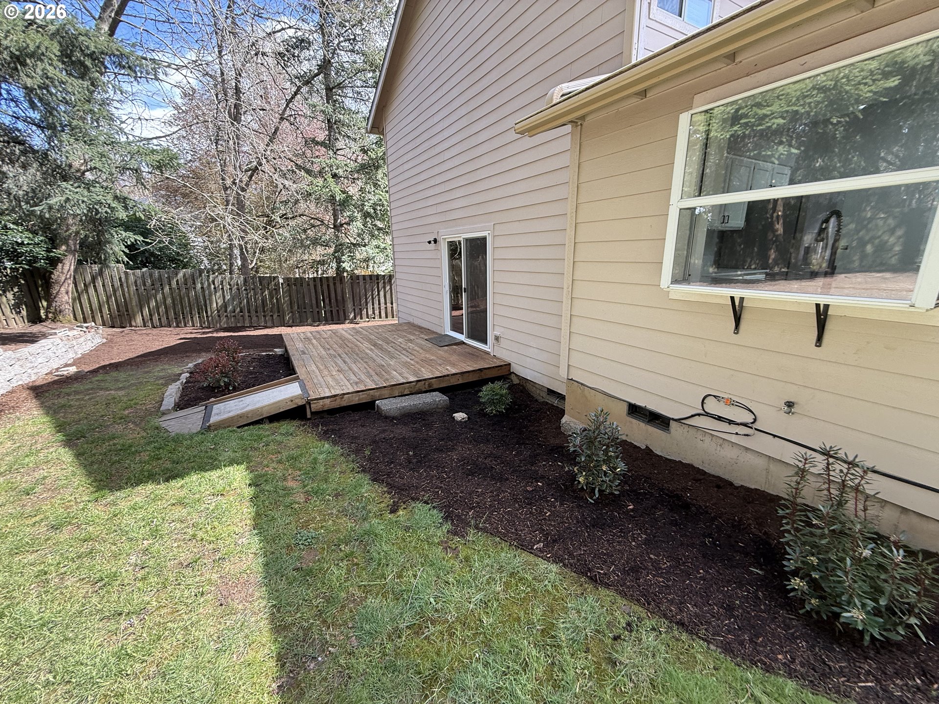 7025 Southwest 164th Terrace Beaverton, OR 97007 - Photo 28 of 28 a view of backyard with outdoor seating