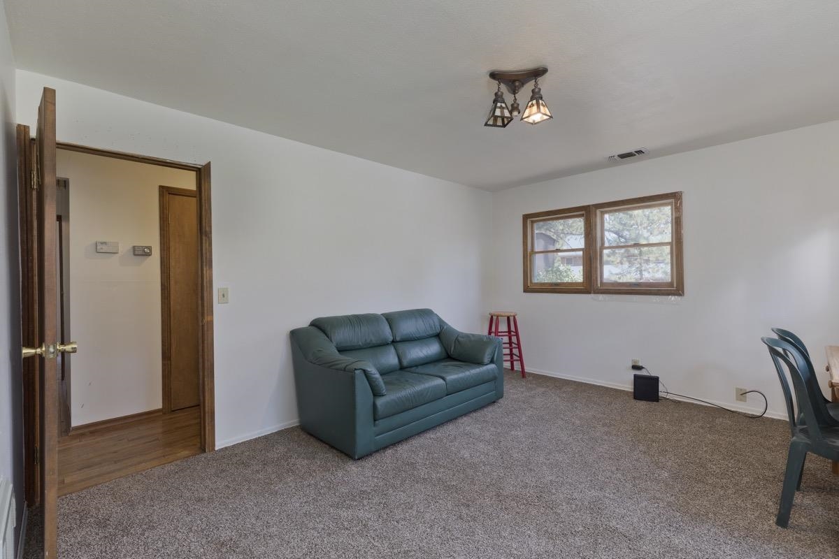 2030 Old Mammoth Road Mammoth Lakes, CA 93546 - Photo 20 of 46 a living room with furniture and a window