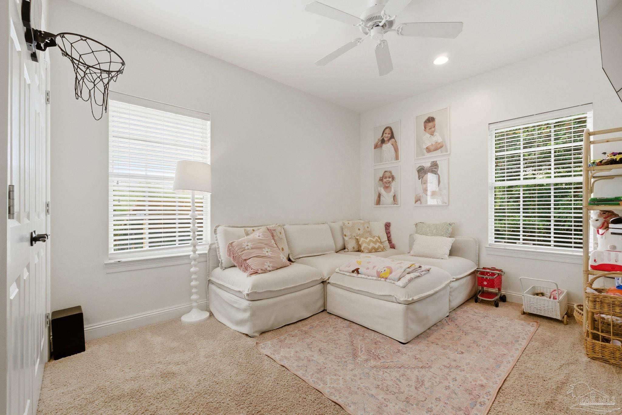 5931 Otter Point Road Pensacola, FL 32504 - Photo 30 of 67 a living room with furniture and a window