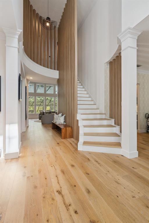 908 Croton Road Celebration, FL 34747 - Photo 11 of 86 a view of entryway and hall with wooden floor
