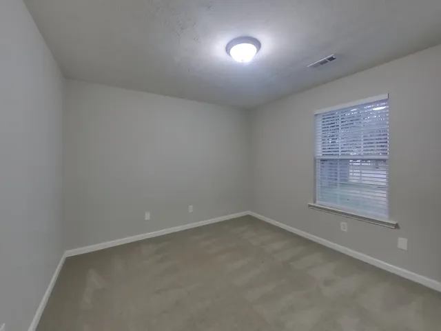 a bathroom with a sink a vanity and a mirror
