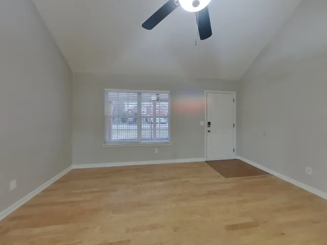 an empty room with windows