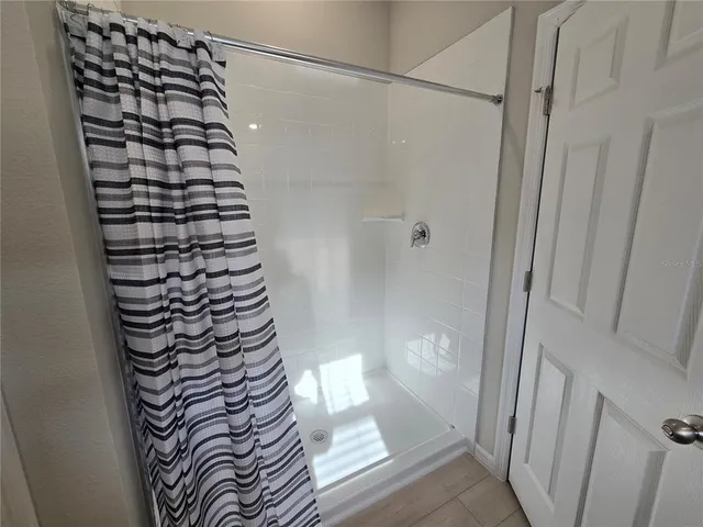 a view of bathroom with shower