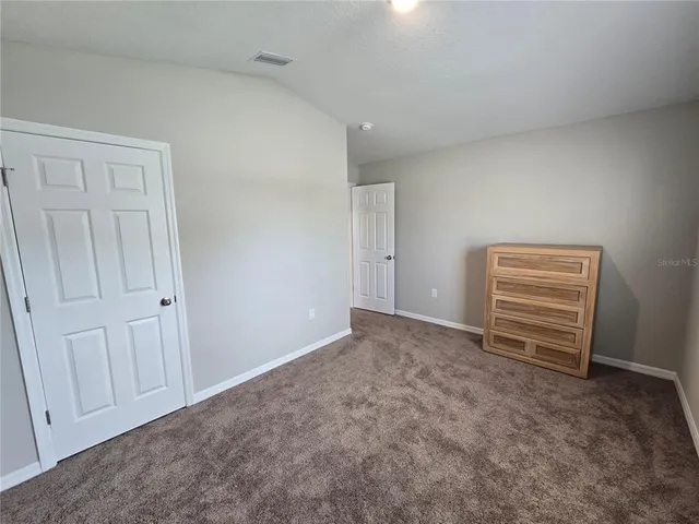 a view of room with yard and hallway