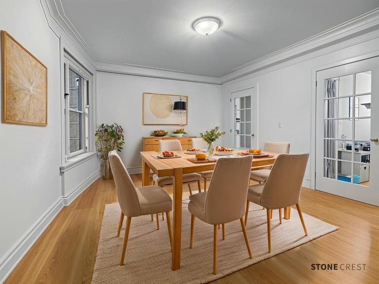 425 Riverside Drive, Unit 8G Manhattan, NY 10025 - Photo 2 of 16 a view of a dining room with furniture and wooden floor