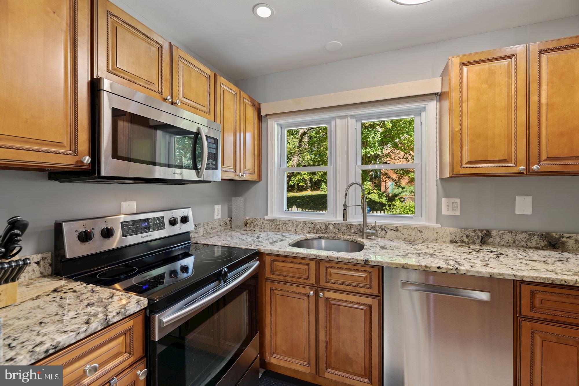 7016 Leesville Boulevard Springfield, VA 22151 - Photo 11 of 60 Kitchen Boasts Upgraded Granite Countertops!
