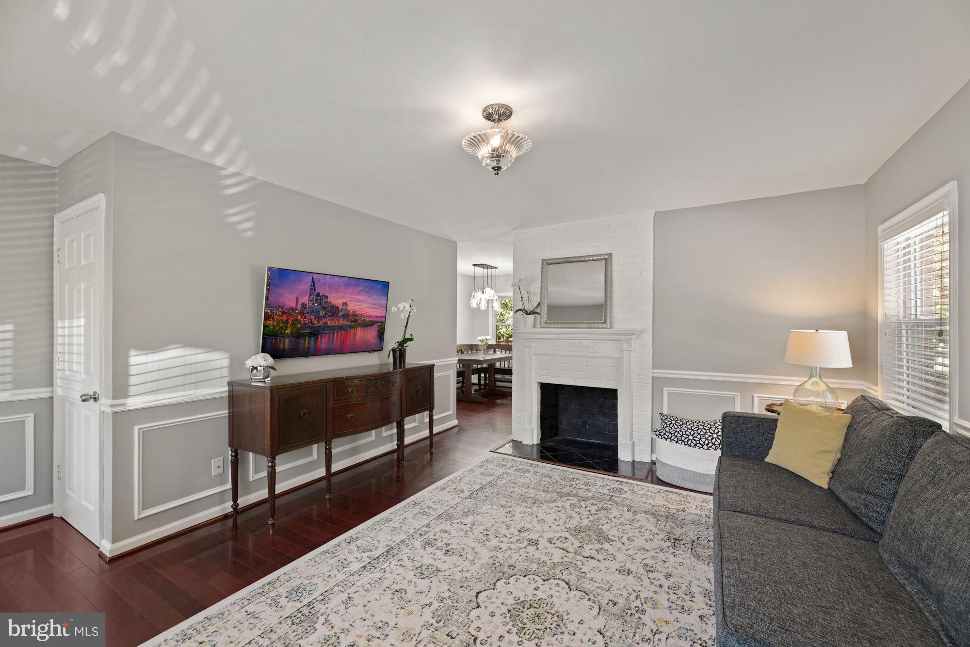 7016 Leesville Boulevard Springfield, VA 22151 - Photo 6 of 60 Living Rm w/ Cozy Wood Burning Fireplace Focal Pt.