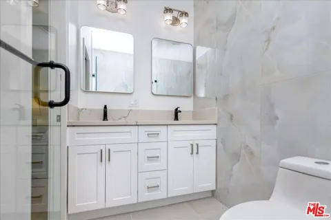 a bathroom with a sink and a toilet