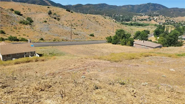 a view of ocean and mountain