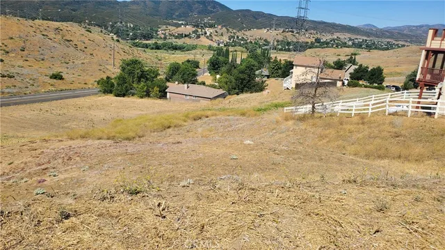 a view of a backyard of a house