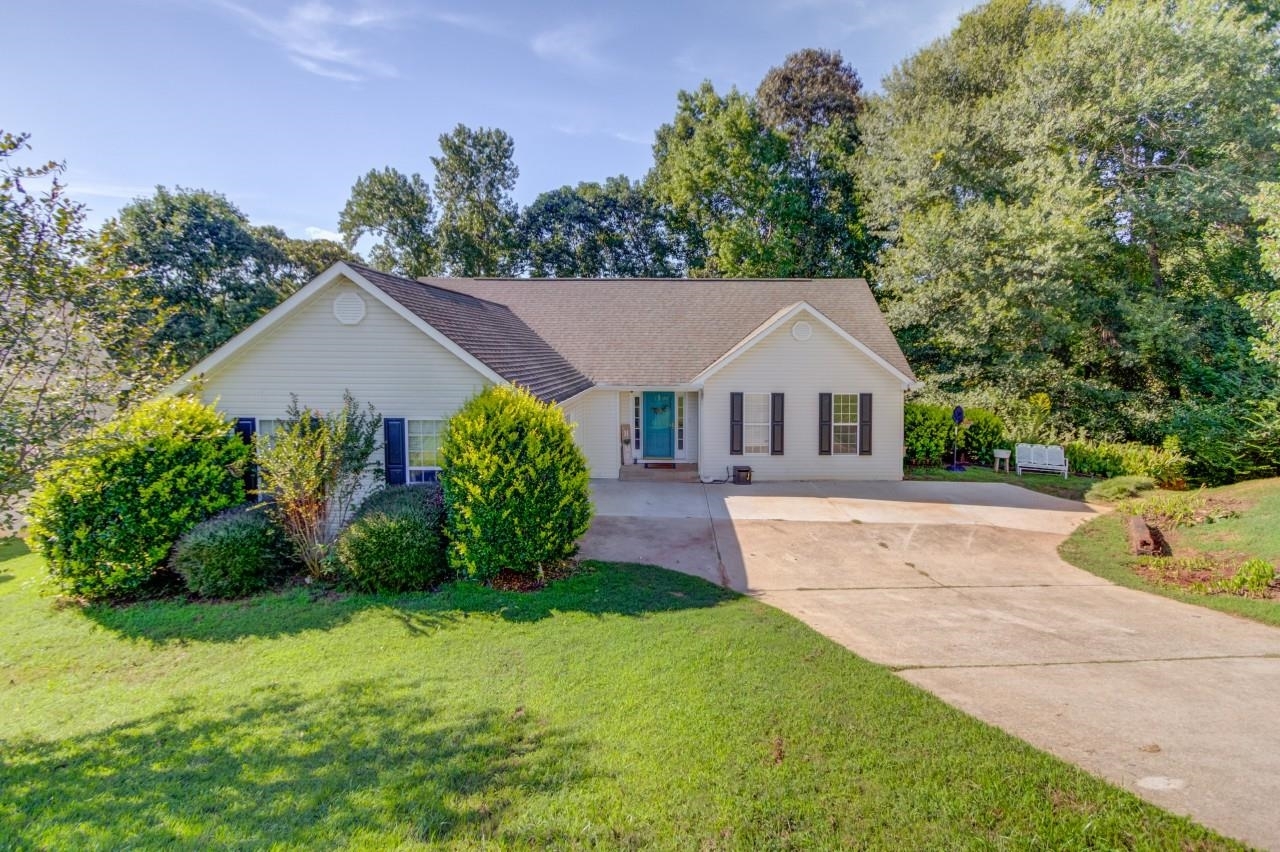 4396 Todd Road Braselton, GA 30517 - Photo 1 of 1 a view of house with garden and a tree