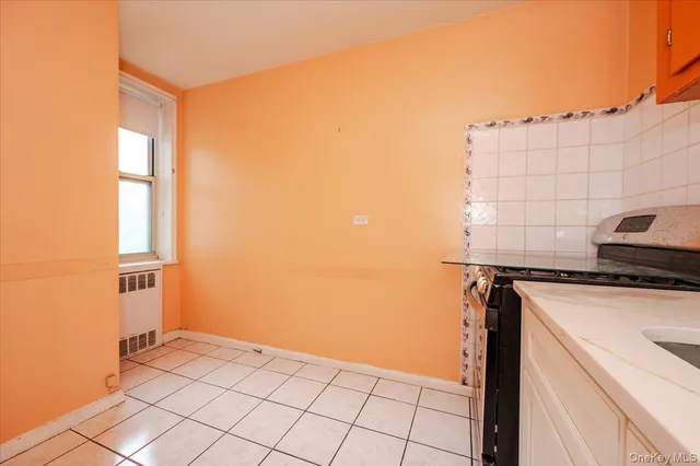 a view of storage and utility room with washer and dryer