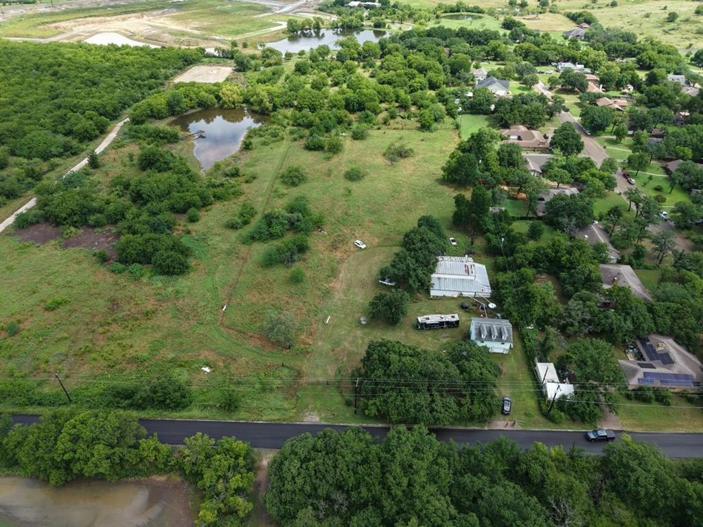 2965 Hartlee Field Road Denton, TX 76208 - Photo 1 of 6 an aerial view of residential house with outdoor space and trees all around
