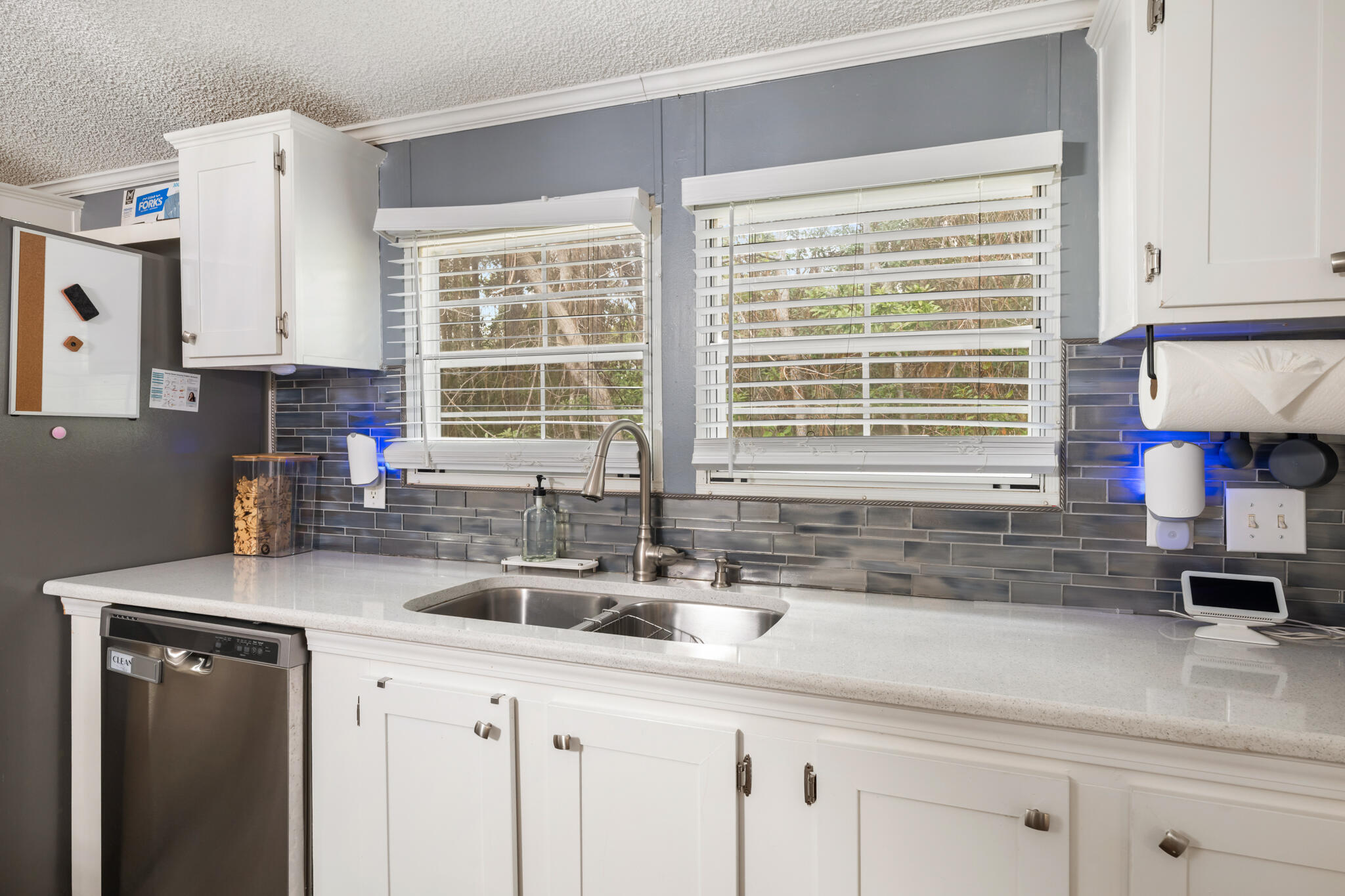 2422 Crescent Wood Road Navarre, FL 32566 - Photo 13 of 42 a kitchen with a sink and a window