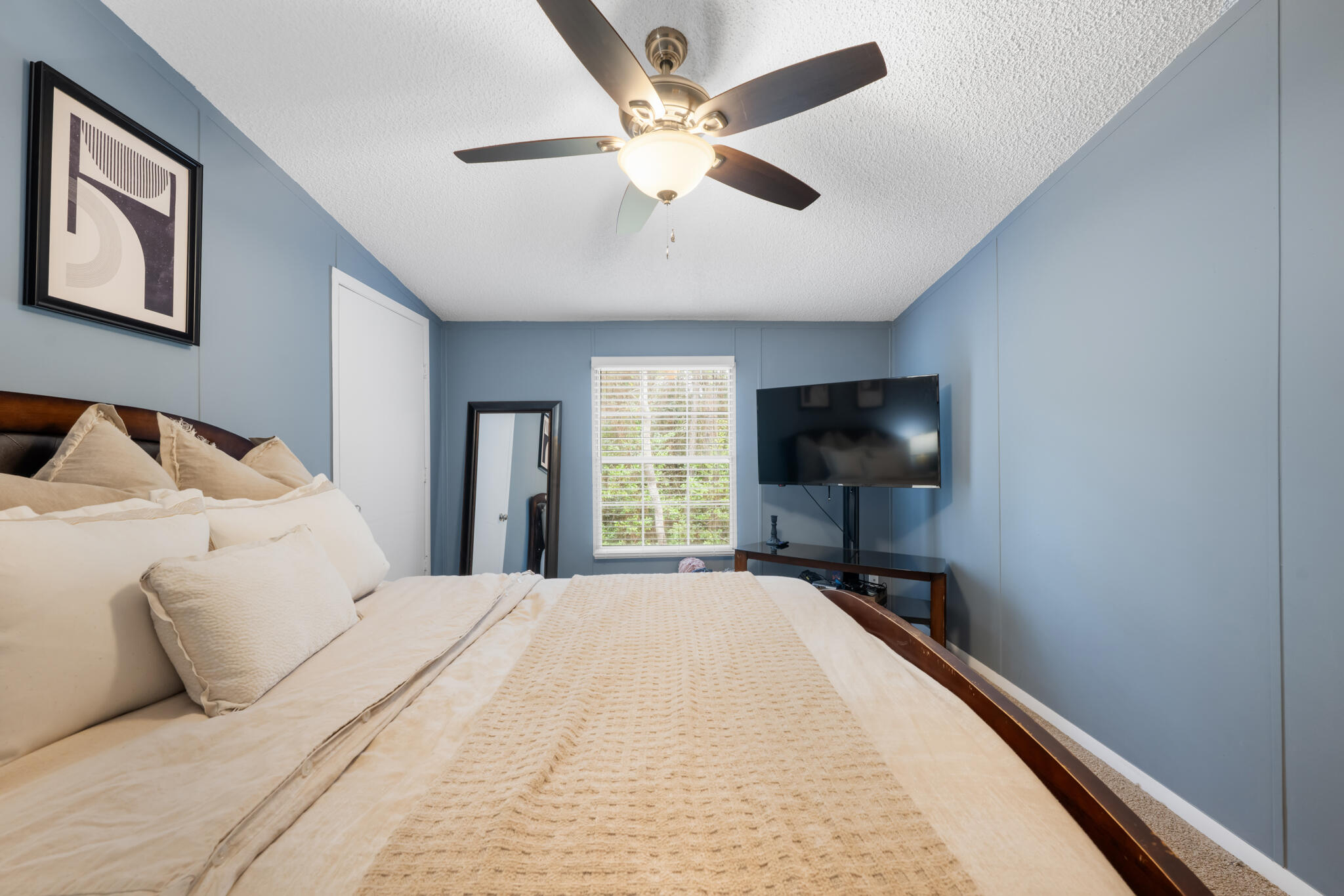 2422 Crescent Wood Road Navarre, FL 32566 - Photo 25 of 42 a bedroom with a bed and window