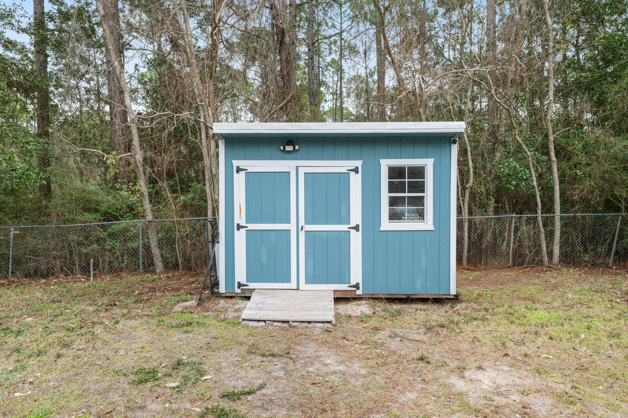 2422 Crescent Wood Road Navarre, FL 32566 - Photo 39 of 42 a house with a outdoor space