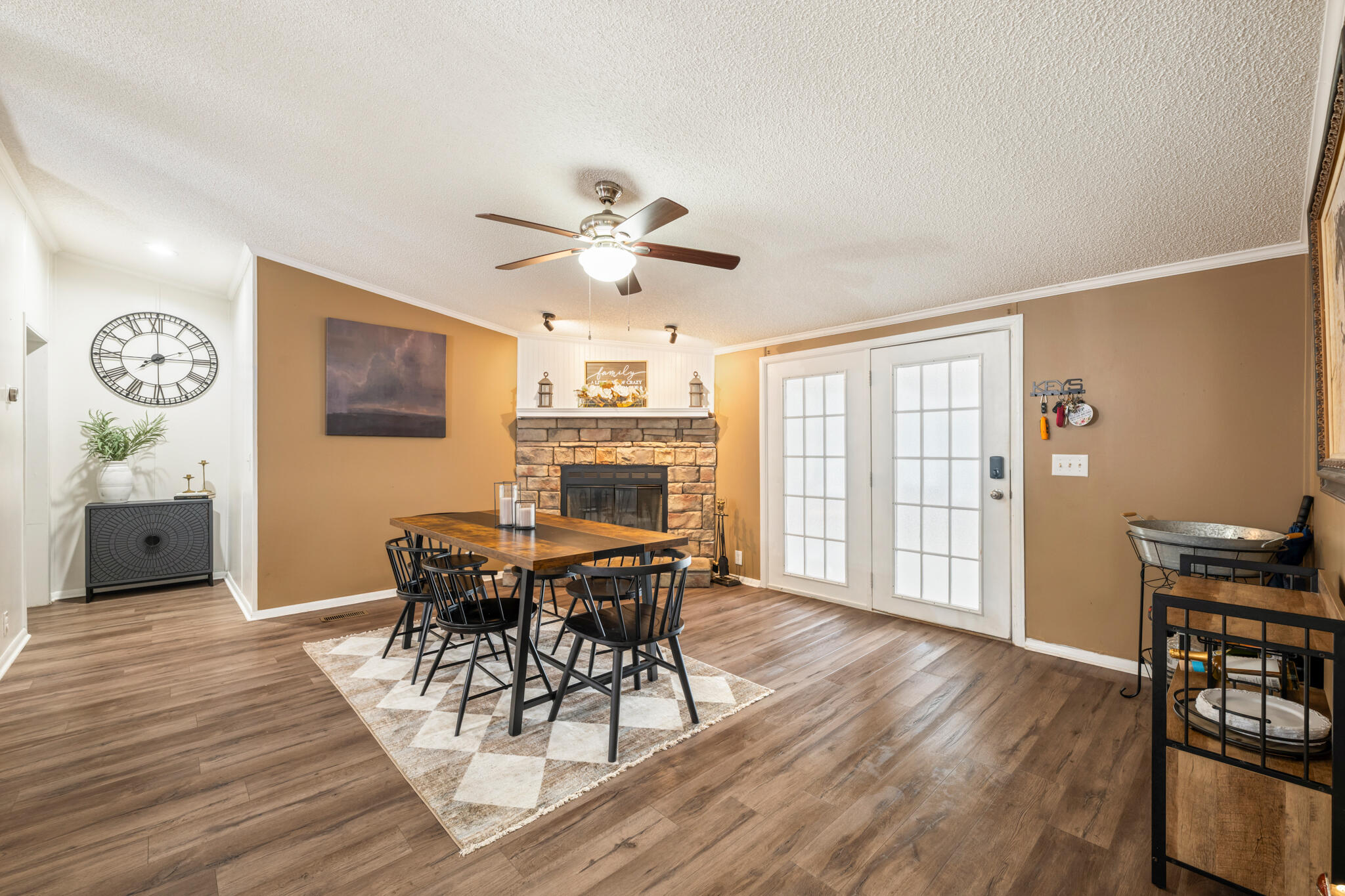 2422 Crescent Wood Road Navarre, FL 32566 - Photo 9 of 42 a view of a dining room with furniture window and wooden floor