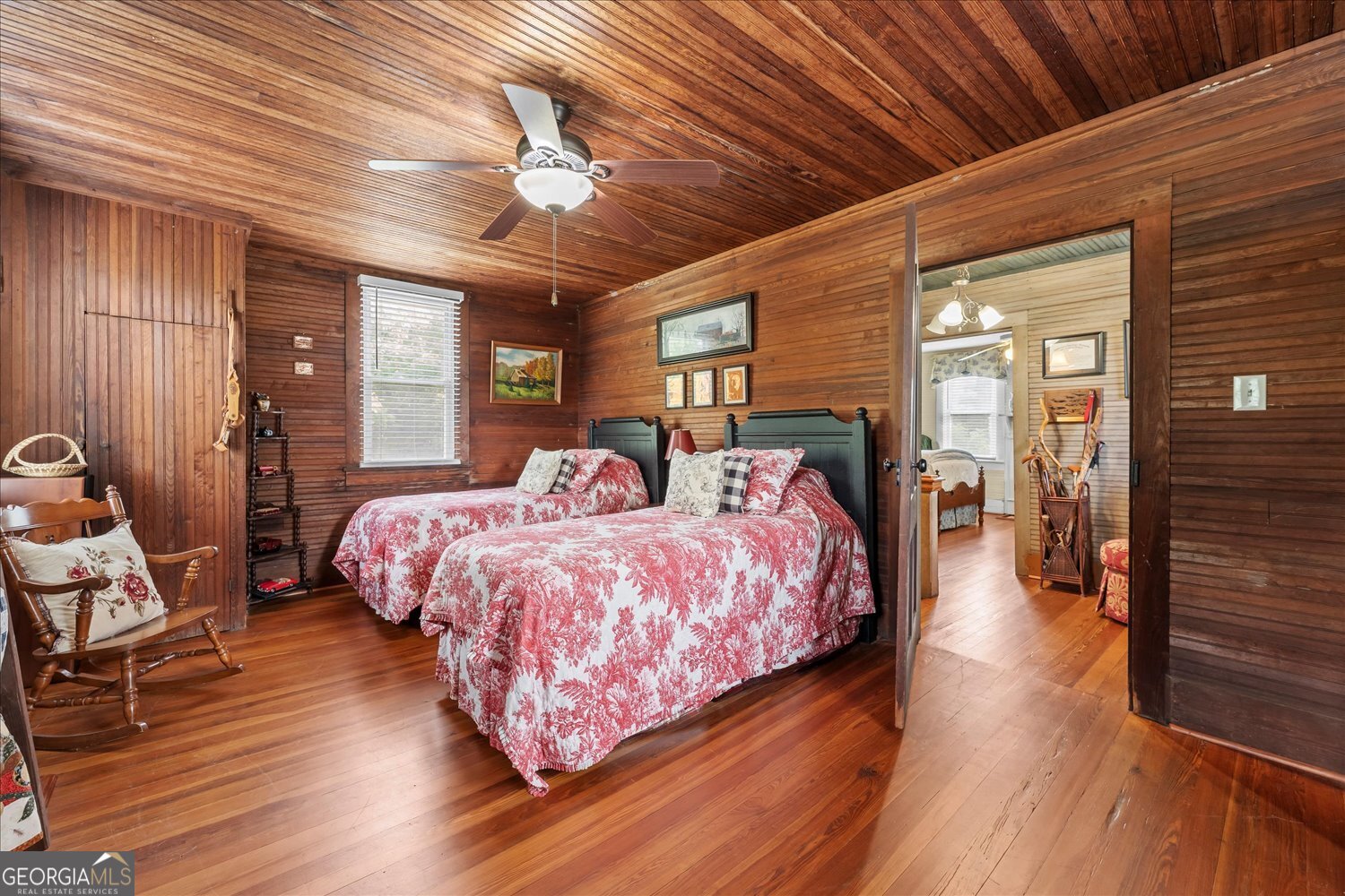 6644 East Cadley Road Norwood, GA 30821 - Photo 39 of 53 a bed room with a bed and wooden floor