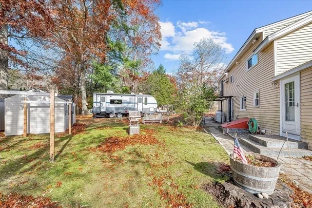 a view of a yard with furniture