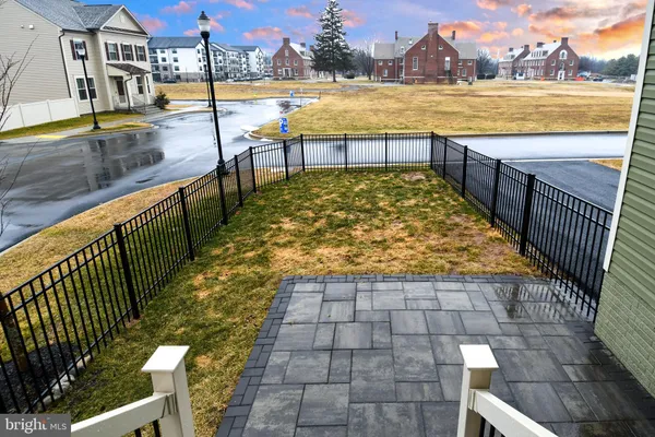 a view of swimming pool with outdoor seating