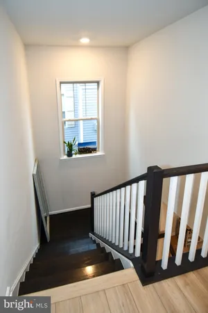 a view of entryway with wooden floor