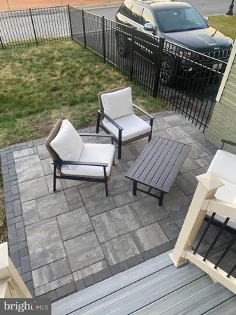 a view of a chairs and table on the terrace