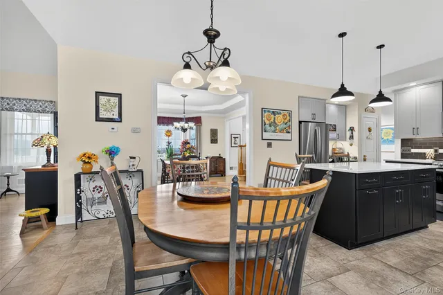 a view of a dining room with furniture