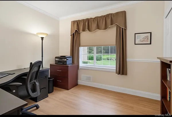 a house view with a garden space