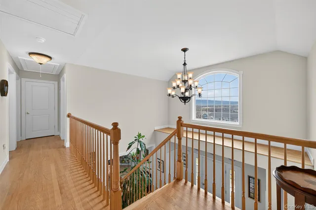 a view of a hallway with windows