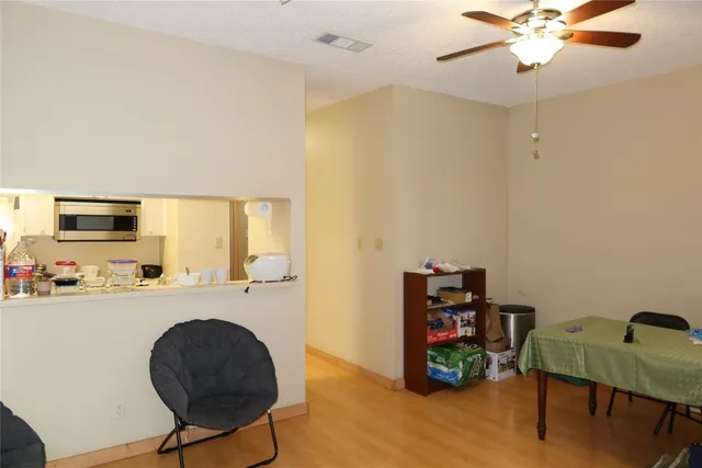 a room with furniture and a flat screen tv