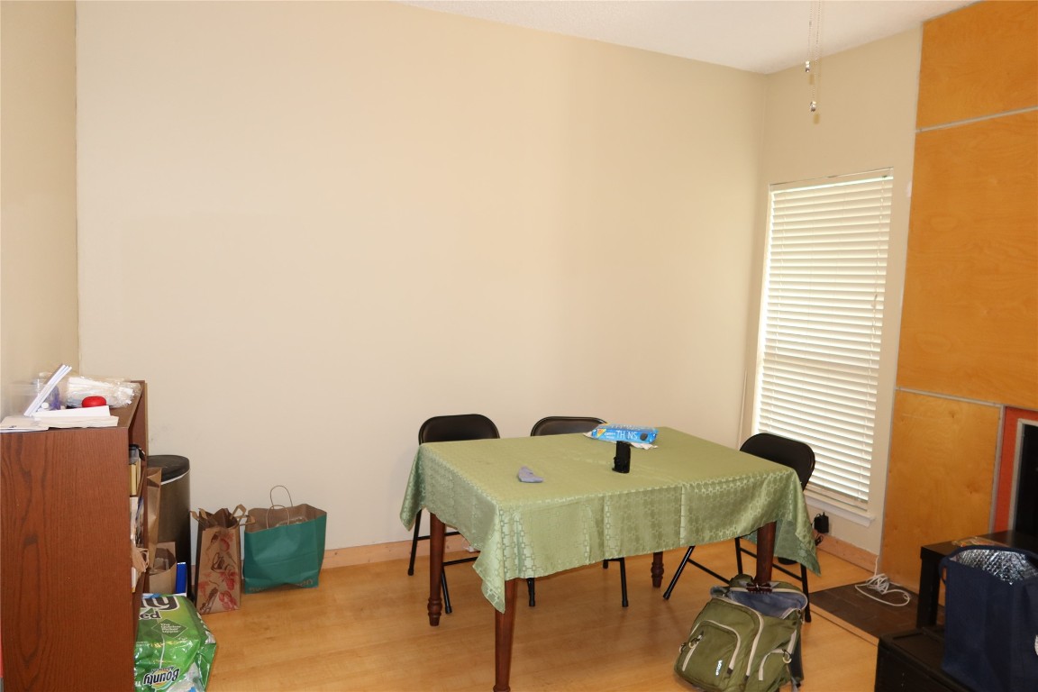 612 Park Place, Unit 202 Austin, TX 78705 - Photo 6 of 25 a view of a workspace with furniture