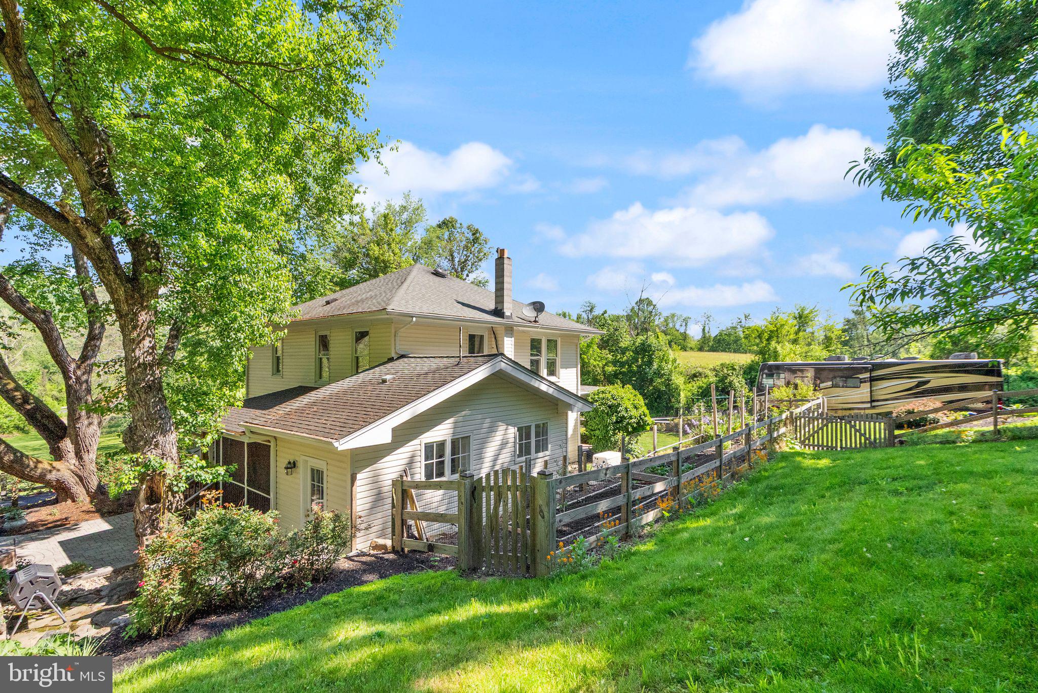37151 Branchriver Road Purcellville, VA 20132 - Photo 53 of 63 a view of a house with a big yard plants and large trees
