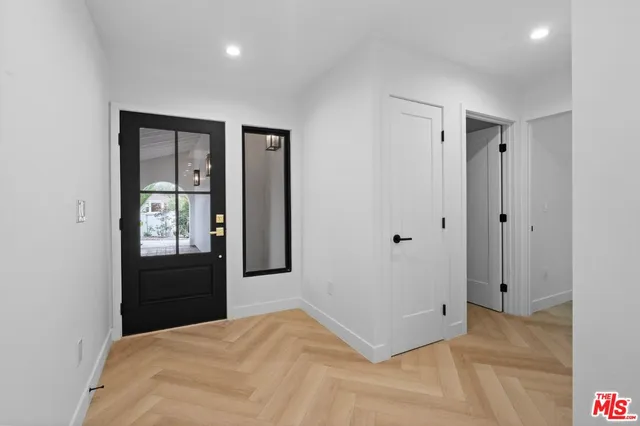 a bedroom with a bed and a closet