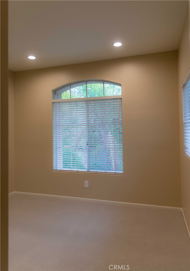 8215 East White Oak Ridge, Unit 108 Orange, CA 92869 - Photo 8 of 15 Upstairs bedroom, recessed lighting and mirrored closet doors-