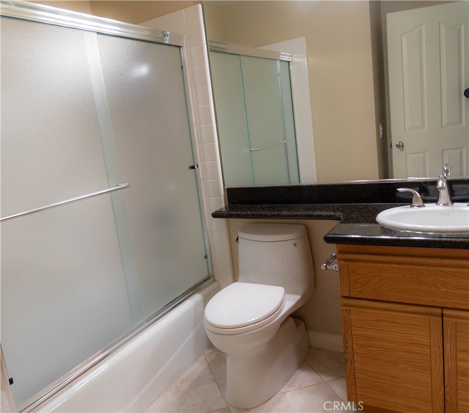 8215 East White Oak Ridge, Unit 108 Orange, CA 92869 - Photo 10 of 15 Downstairs bathroom with shower over tub