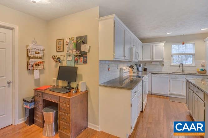 13 East Point Road Palmyra, VA 22963 - Photo 11 of 47 a kitchen with stainless steel appliances cabinets and a window
