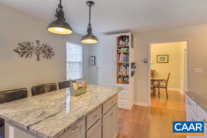 13 East Point Road Palmyra, VA 22963 - Photo 15 of 47 a kitchen with a table and chairs in it